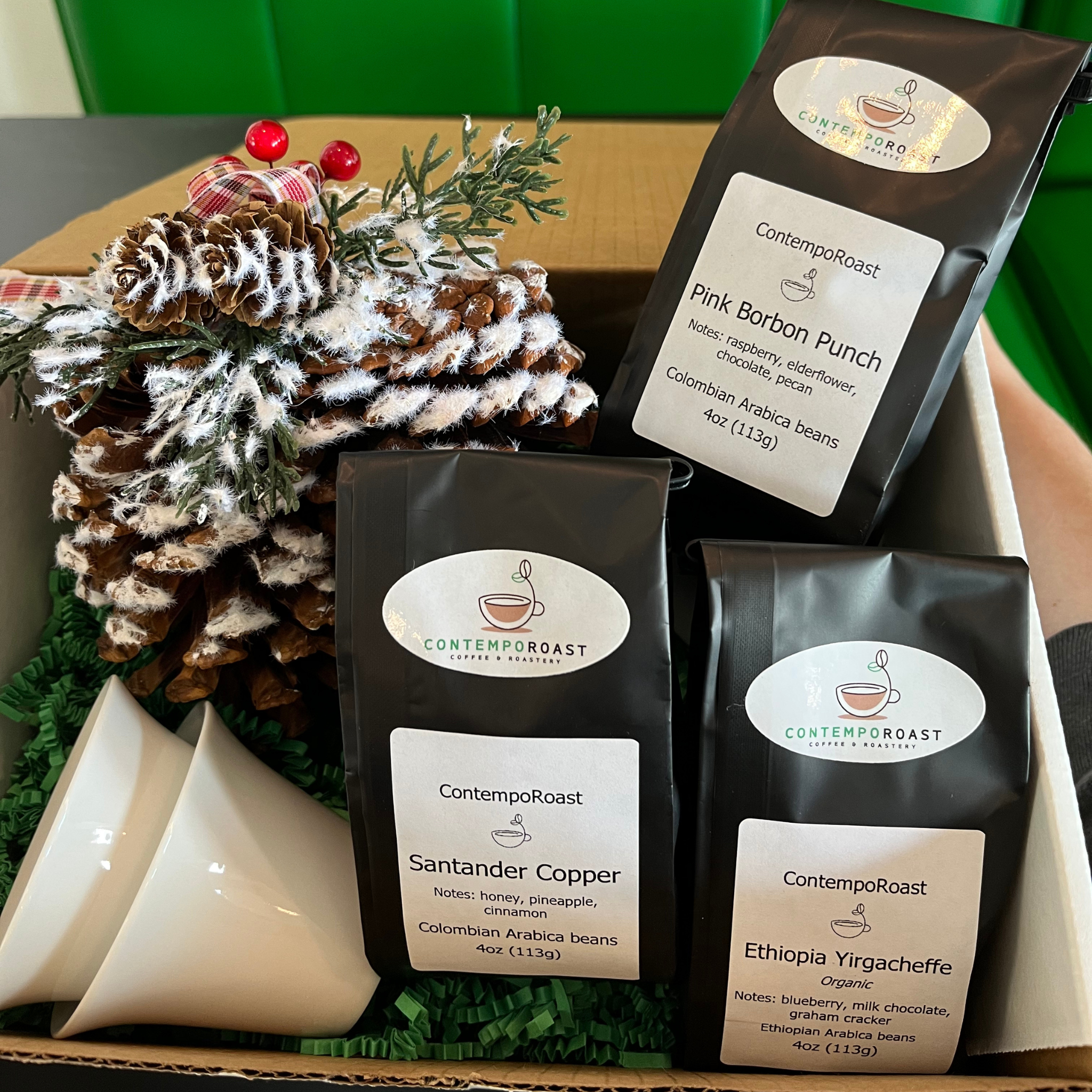 two 3oz porcelain notNeutral Cala tasting cups with the Bright set of three 4oz bags of coffee in a gift box
