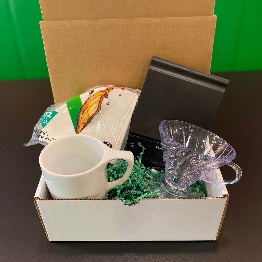 notNeutral Lino 16-oz mug, a Hario V60 coffee dripper, 100 Hario V60 filters, and a scale with timer in a gift box