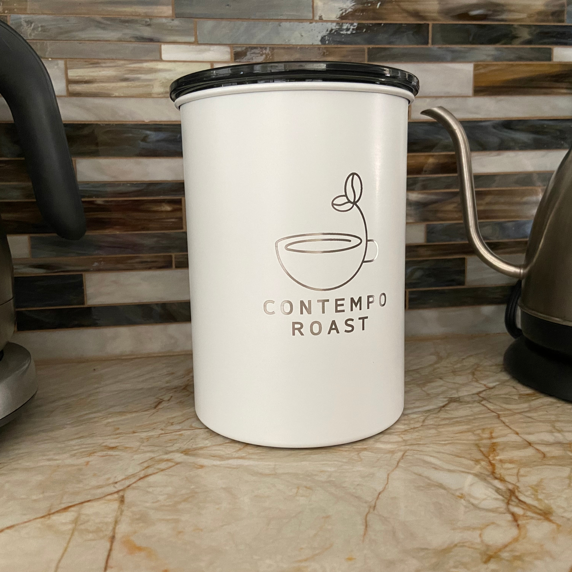 matte white canister with the ContempoRoast logo etched on the front, sitting on a kitchen countertop
